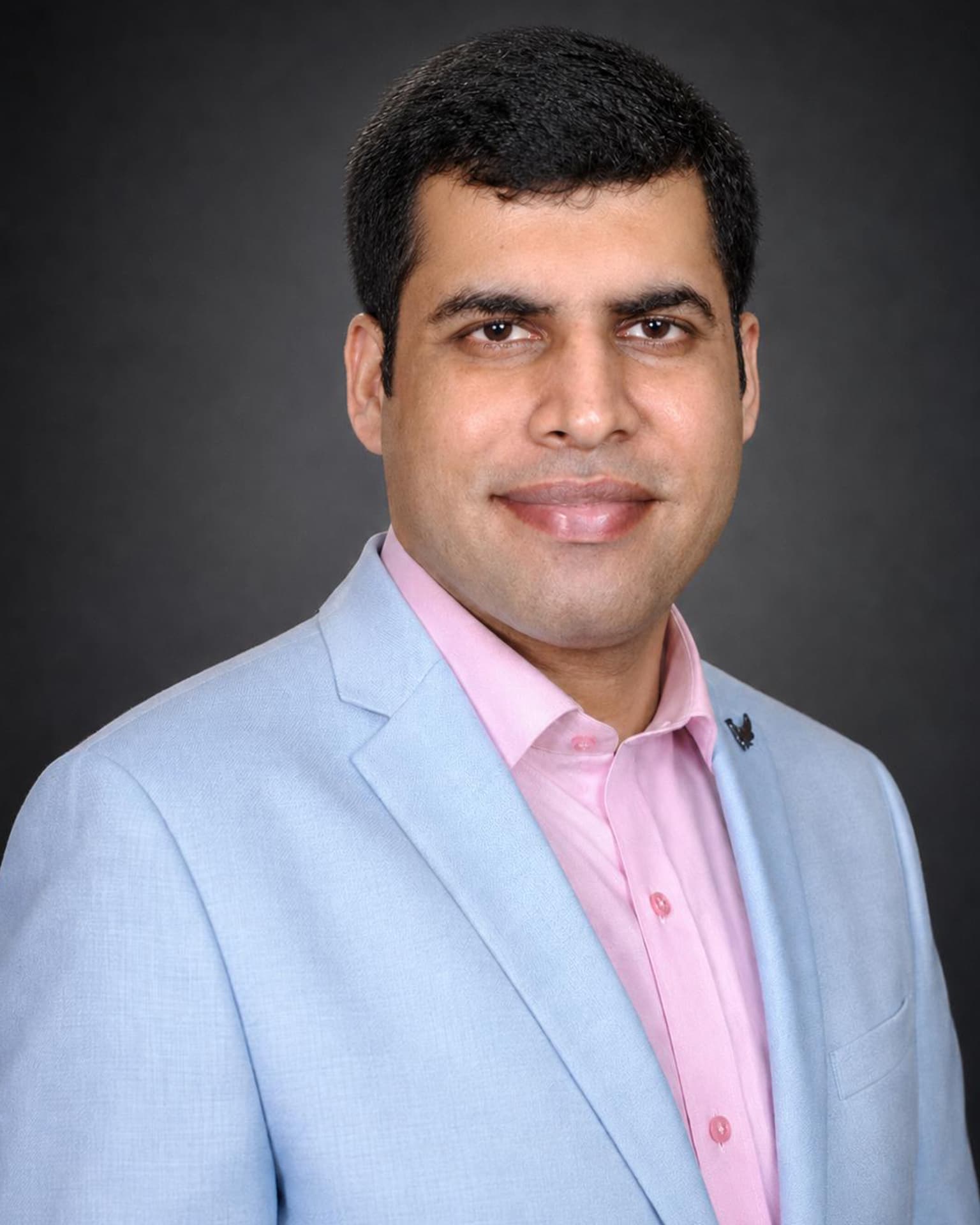 Dr. Harit Talwar